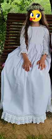 Продам дитяче плаття ніжно-білого кольору для урочистої Першої Сповіді і Урочистого Святого Причастя Сколе